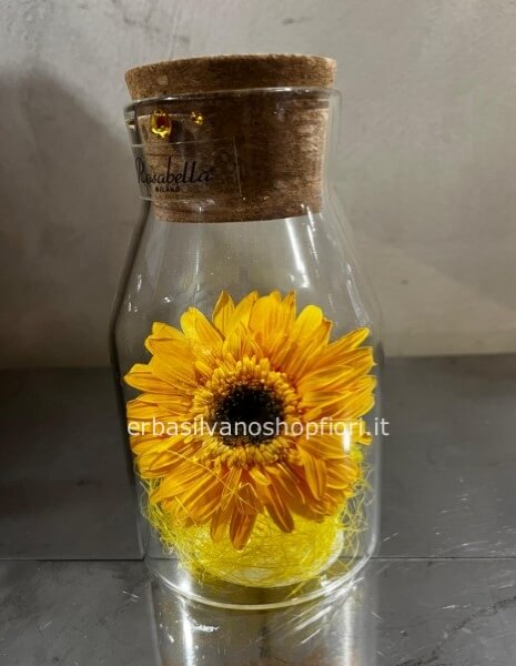 Gerbera eterna in bottiglietta di vetro